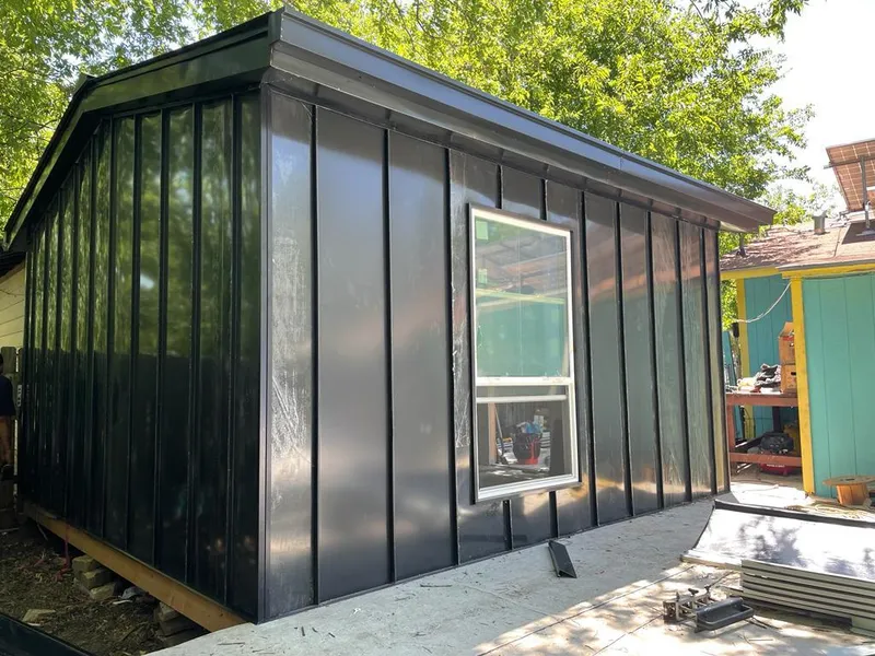 Black standing seam metal wall panels for Roof Inspection in Stamford